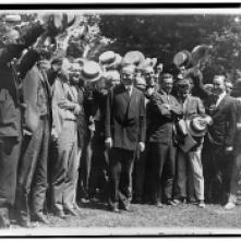 Newspapermen cheering CC after first conference with him 1923