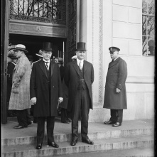 President Coolidge with his secretary, Everett Sanders, outside the International Civil Aeronautics Conference, December 12, 1928.