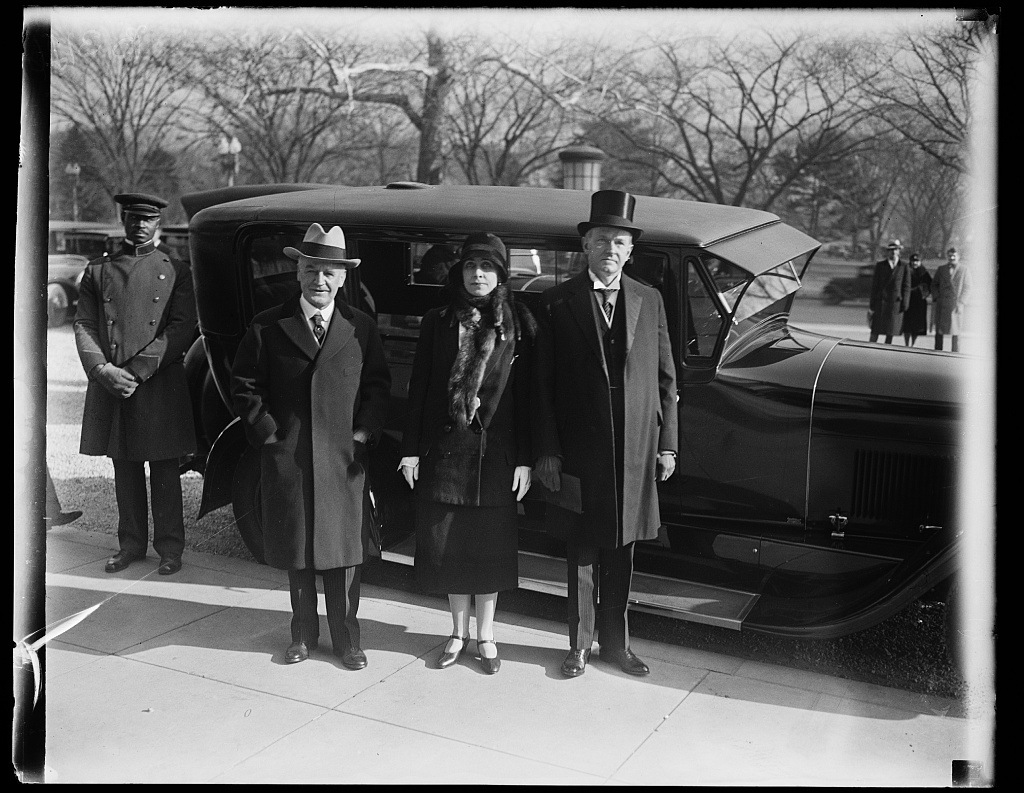 The Coolidges and Ambassador Dwight W. Morrow attend the International Conference of American States, December 1928 