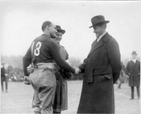 Frederick S. Bale introducing Benny Boynton, captain of the Williams College team, to Vice-President-Elect Calvin Coolidge before the Amherst-Williams game, won by Amherst 14-7. [Original in Morrow Papers, Series XIV, box 1, folder 100]