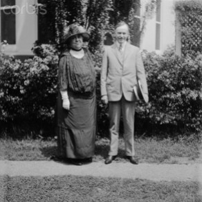 28 Jun 1924, Washington, DC, USA --- Original caption: Photo shows Mrs. Harriet Taylor Upton of Warren, Ohio, with President Calvin Coolidge on the lawn of the White House. Mrs. Harriet Taylor Upton has her hat in the ring for a seat in Congress, from the 19th District of Ohio, this fall and is now visiting in the nation's capital. President Coolidge escorted her about the White House grounds to view the beautiful roses now in bloom. --- Image by © Bettmann/CORBIS