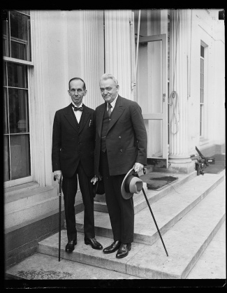 President Coolidge receives Massey and J. R. King, Director of Public Health Canada, at the White House, 1927. Photo credit: Library of Congress.